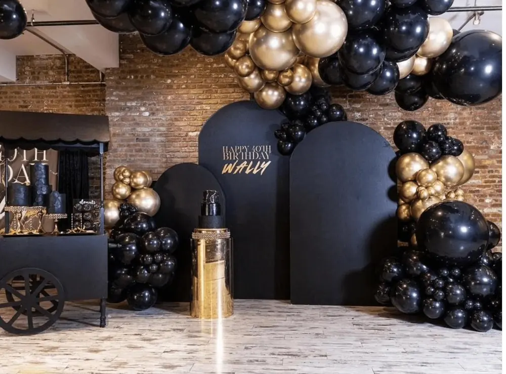 Black and gold 40th birthday setup