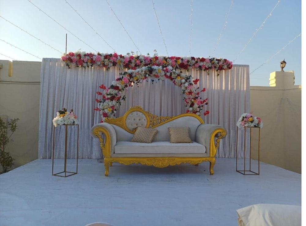 Outdoor floral lounge setup